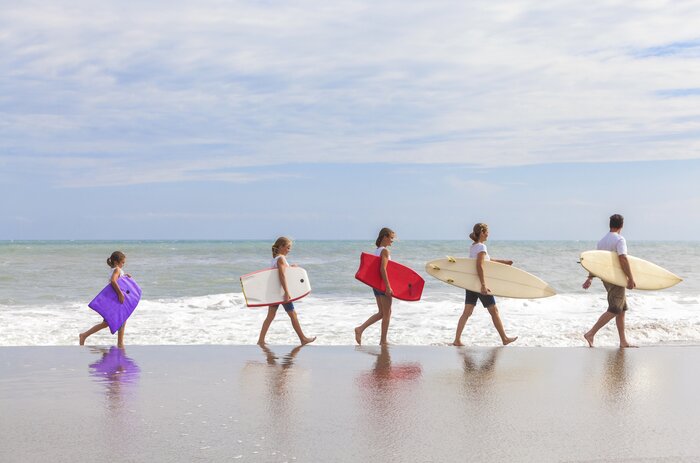 Take a family surfing lesson on Playa Tamarindo