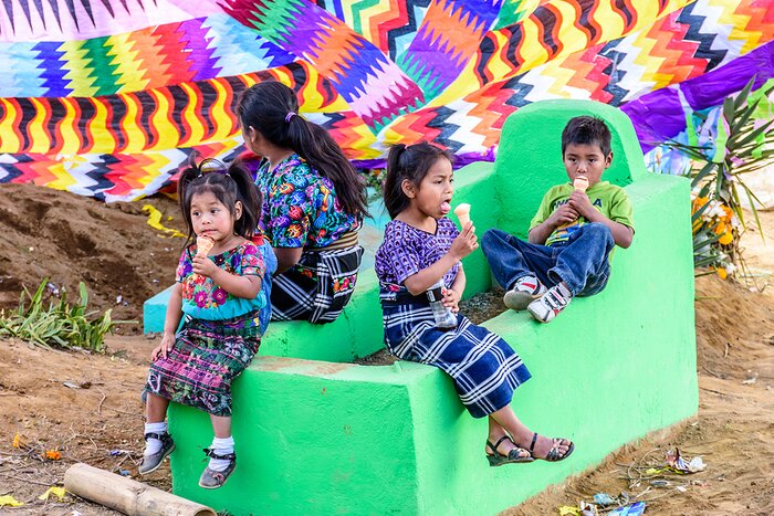 Guatemalan children celebrating All Saint's Day with ice cream
