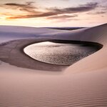 Discover the sand dunes and turquoise lagoons in Lençóis Maranhenses National Park