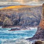 Hike along the Eshaness Cliffs in the secluded Shetland Islands