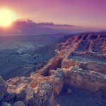   Beautiful sunrise over Masada fortress and the Judean Desert