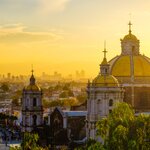 Scenic view of the Basilica of Guadalupe and Mexico City's skyline