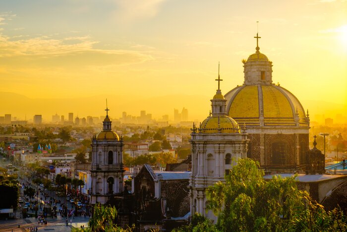 Scenic view of the Basilica of Guadalupe and Mexico City's skyline