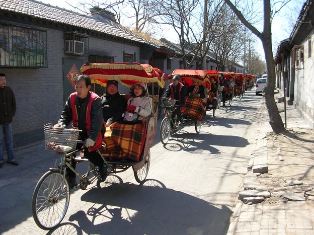 Hutongs Exploration: Pedicab Ride and Local Family Visit