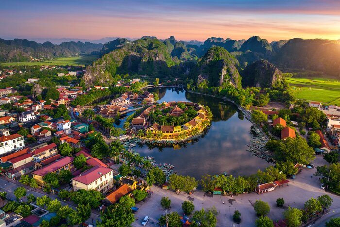 Discover Tam Coc's limestone karsts and caves