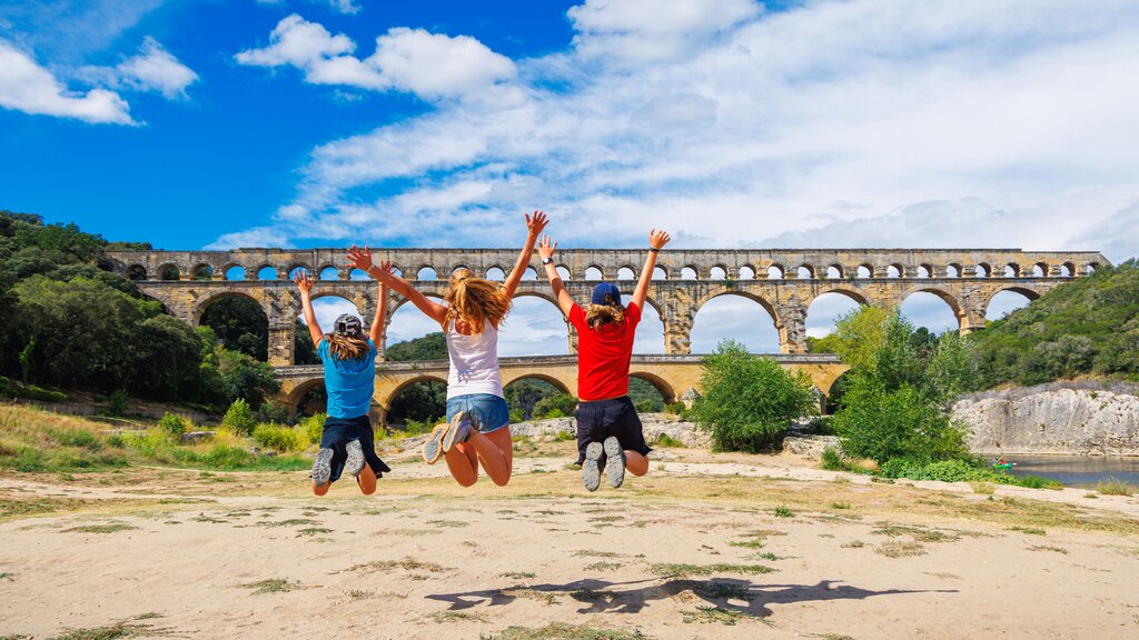 Pose for a family pic at the ancient Roman ruins of the Pont du Gard outside Avignon