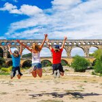 Pose for a family pic at the ancient Roman ruins of the Pont du Gard outside Avignon