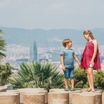 Admire Barcelona city from Montjuic hill on an 8-day family vacation in Spain