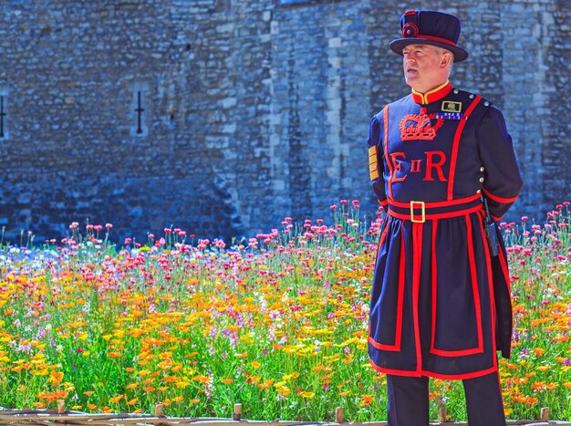 A Yeoman of the Guard stands sentry outside the Tower of London
