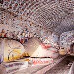 Discover the Buddhist statues and frescoes within  Mogao Caves