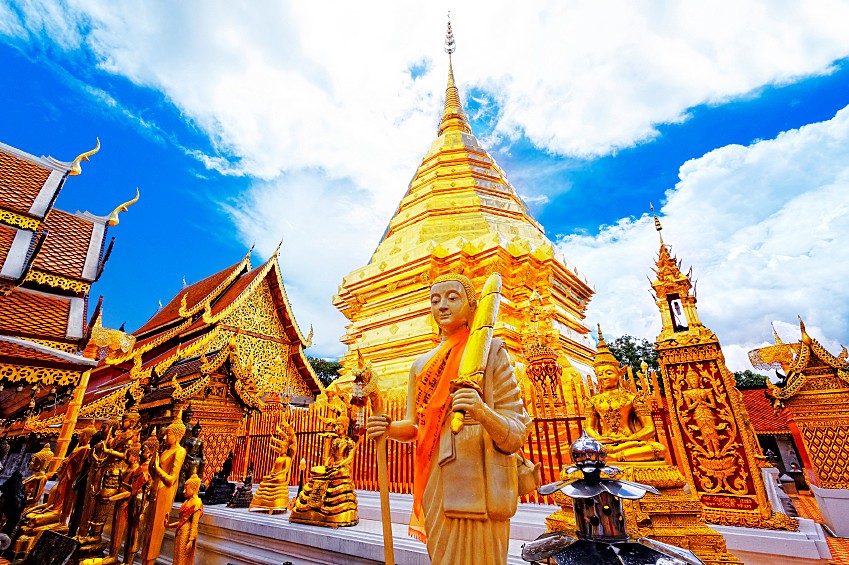 Visit the sacred Doi Suthep Temple at sunset