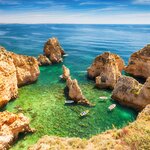Drive south to the cliffs and beaches of the Algarve before crossing into Spain