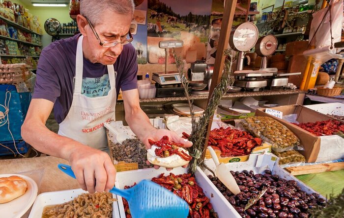 Taste local eats at Palermo's market in Sicily