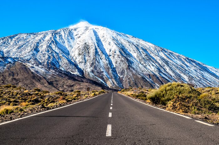 Discover Tenerife's volcanic Roque Cinchado in Teide National Park and marvel at Pico del Teide