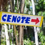 A sign showing the direction of a cenote in the Yucatán Peninsula