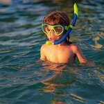 Kids love snorkeling around Costa Rica's friendly (and stunning) beaches