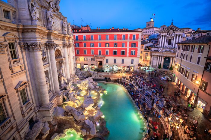 Start your trip in Rome and take an evening walk to the Trevi Fountain