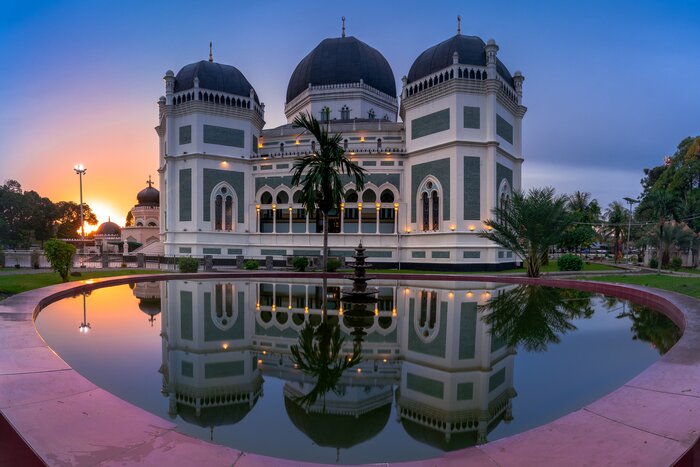 Head to Medan on Sumatra in September for cultural exploration and visit the Masjid Raya Al-Mashun mosque