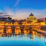 Start your trip in Rome where you can get views of the Vatican from the Tiber River
