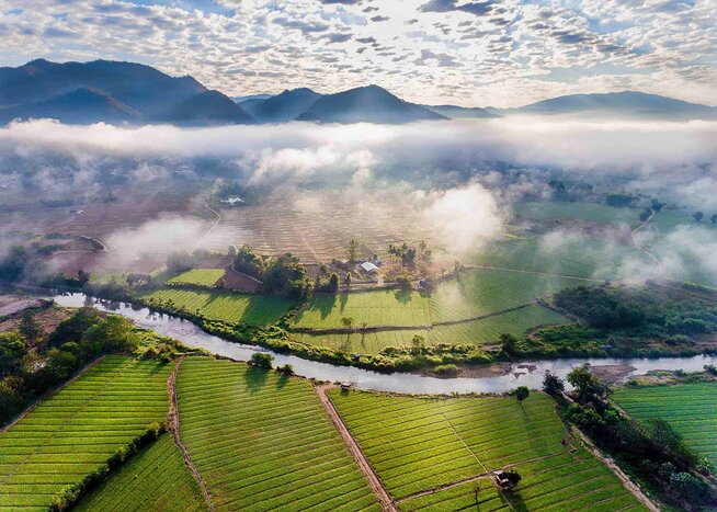 Take in some of the gorgeous views of Thailand and Cambodia, like this view of the Pai rice fields