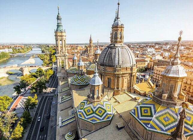 Private transfer : {{start_location}} to {{end_location}} with day trip to Zaragoza
