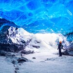 Hiker in an ice cave