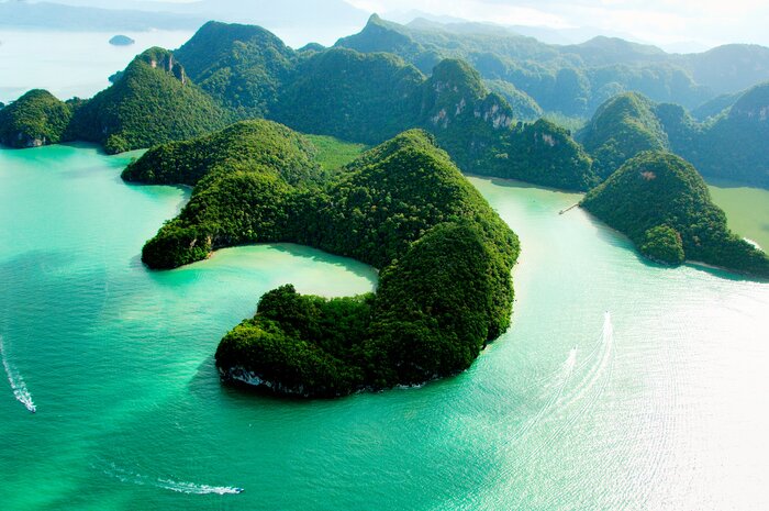 Experience Langkawi's verdant hillsides on an daytime boat cruise