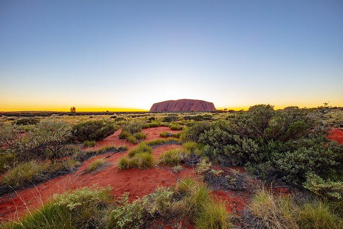 Watch the sunset over Uluru with a memorable al fresco dining experience