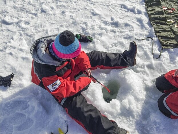 Ice Fishing by Snowmobile Sleigh