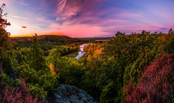 Catch an autumnal sunset over a Swedish landscape