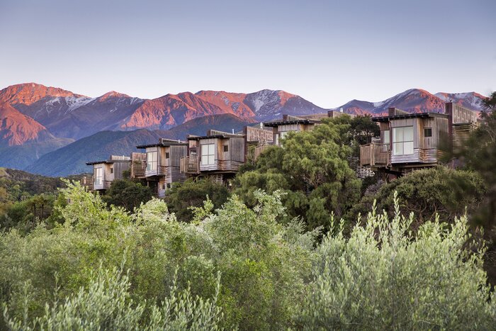 Stay at one-of-a-kind luxury retreats as you explore the South Island (photo courtesy of Hapuku Lodge and Tree Houses)