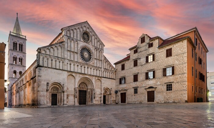 View of the façade of the Cathedral of St. Anastasia at sunrise in Zadar