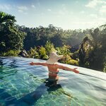 Soak up your idyllic surroundings from an infinity pool during a one-week luxury tour in Indonesia