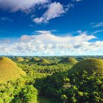 Visit the Chocolate Hills of Bohol Island on this rural Philippines tour