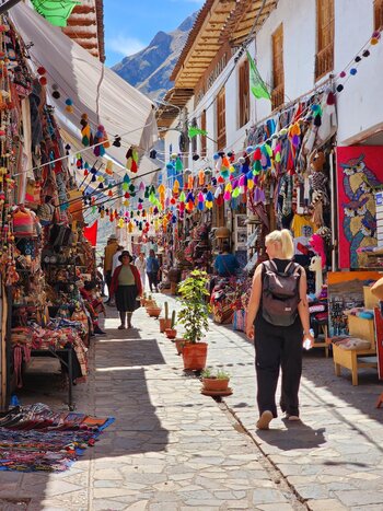 Pass by Pisac Market & an Andean camelid Farms  