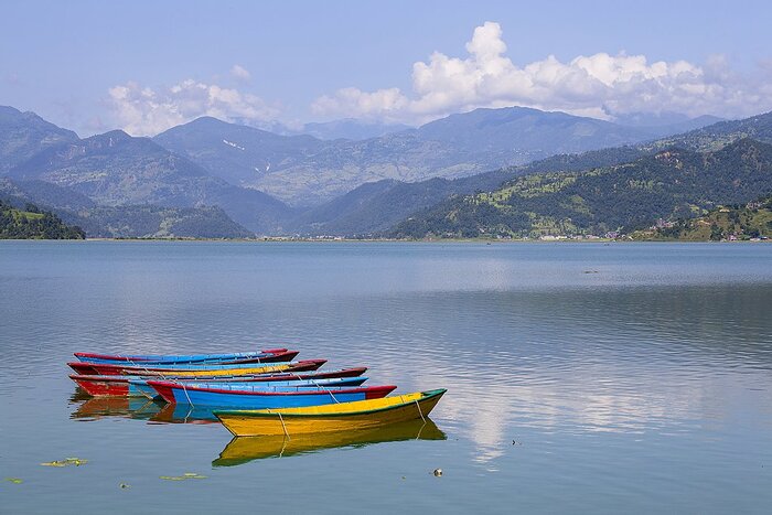 Discover Phewa Lake in Pokhara in February and enjoy the surrounding views of Annapurna mountain range