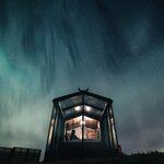 You'll find plenty of opportunities to see the aurora borealis on your trip to Iceland (photo courtesy of Panorama Glass Lodges)