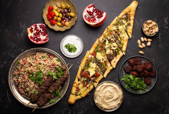 Try traditional Turkish dishes like pide or kebabs