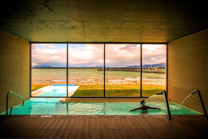 Stay in a masterfully-designed 5-star lodge on the shores of Seno Última Esperanza (photo courtesy of Singular Patagonia)