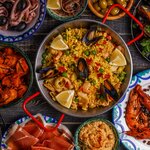 Start your Iberian adventure in Spain, where tapas and pintxos are on the menu