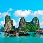Spend time exploring Vietnam's Ha Long Bay on board a junk