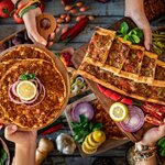 Try a variety of delicious Turkish dishes like "pide," also known as "Turkish pizza"
