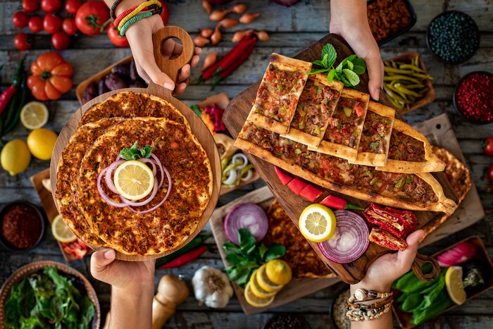 Try a variety of delicious Turkish dishes like "pide," also known as "Turkish pizza"