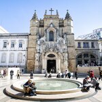Learn about historic Coimbra landmarks like the Santa Cruz Church, founded in the 12th century