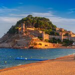 Visit beaches and medieval towns along the Costa Brava