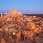 Visit the mud-brick Shali Old Town, an ancient Berber settlement in the Siwa Oasis