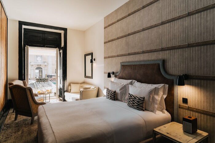 Settle into your suite before heading out to explore Portugal's buzzing capital, Lisbon (photo courtesy of AlmaLusa Baixa/Chiado)