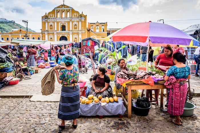 Browse the colorful market of Santa Maria de Jesus near Antigua