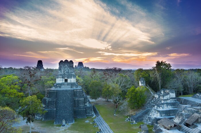 See the Maya ruins of Tikal