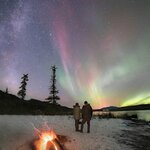 You'll have plenty of chances to glimpse the elusive northern lights on this winter adventure in Canada's remote northern provinces